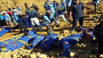Casi un centenar de muertos por una avalancha en Birmania