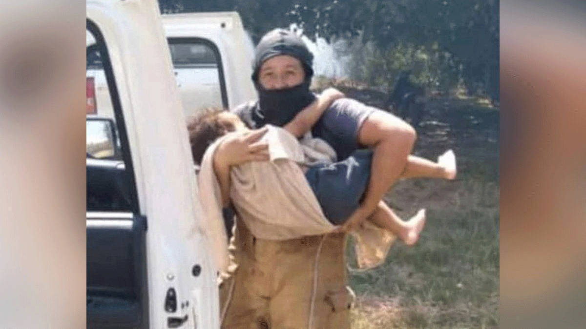 Heroína. Una bombera rescató a un nene de 2 años entre las llamas.