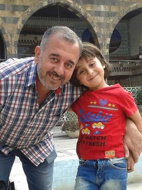 Son Osama con su hijo