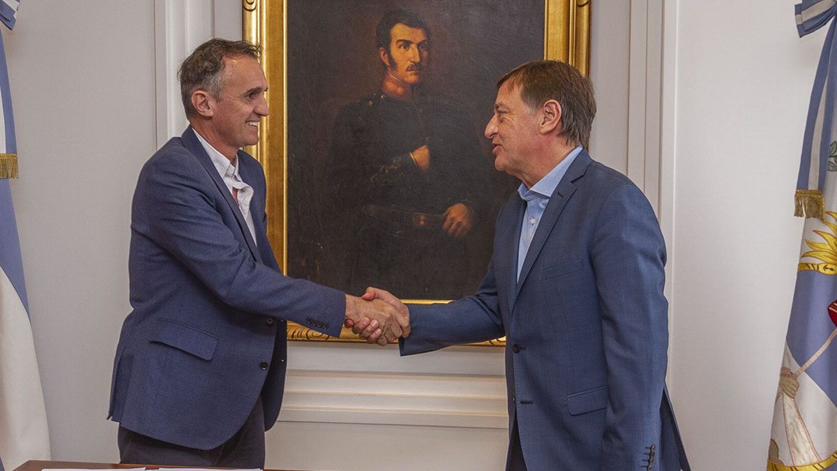 Katopodis y Suarez. Esta vez no habrá apretón de manos porque el encuentro será virtual.