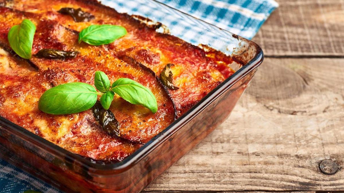 La receta de berenjena a la parmesana es exquisita y le gusta a casi todo el mundo. La receta de berenjena a la parmesana es exquisita y le gusta a casi todo el mundo.