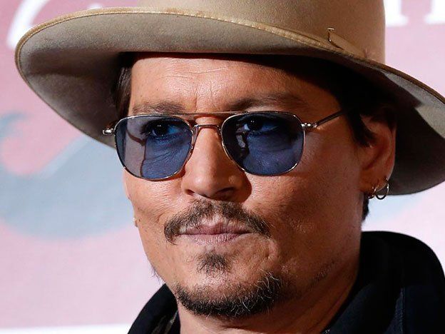 Johnny Depp, llevate tus pichichos a casa