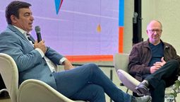 Omar De Marchi junto a Alejandro Castro Santander, especialista en Educación.  