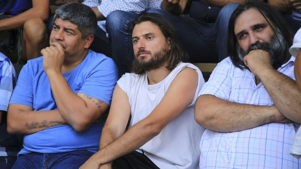 Juan Grabois, en el centro, junto a los sindicalistas Pablo Moyano y Roberto Baradel.