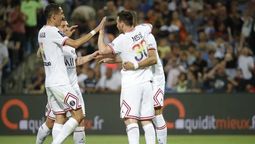 Di María y Messi festejan uno de los goles del PSG.