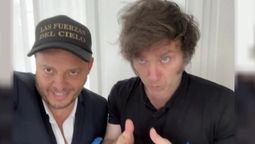 Demiéan Reidel y Javier Milei.