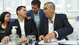 El presidente del bloque de la UCR, Jorge López, y el presidente de la Cámara de Diputados, Andrés Lombardi, junto al ministro de Economía, Enrique Vaquié.
