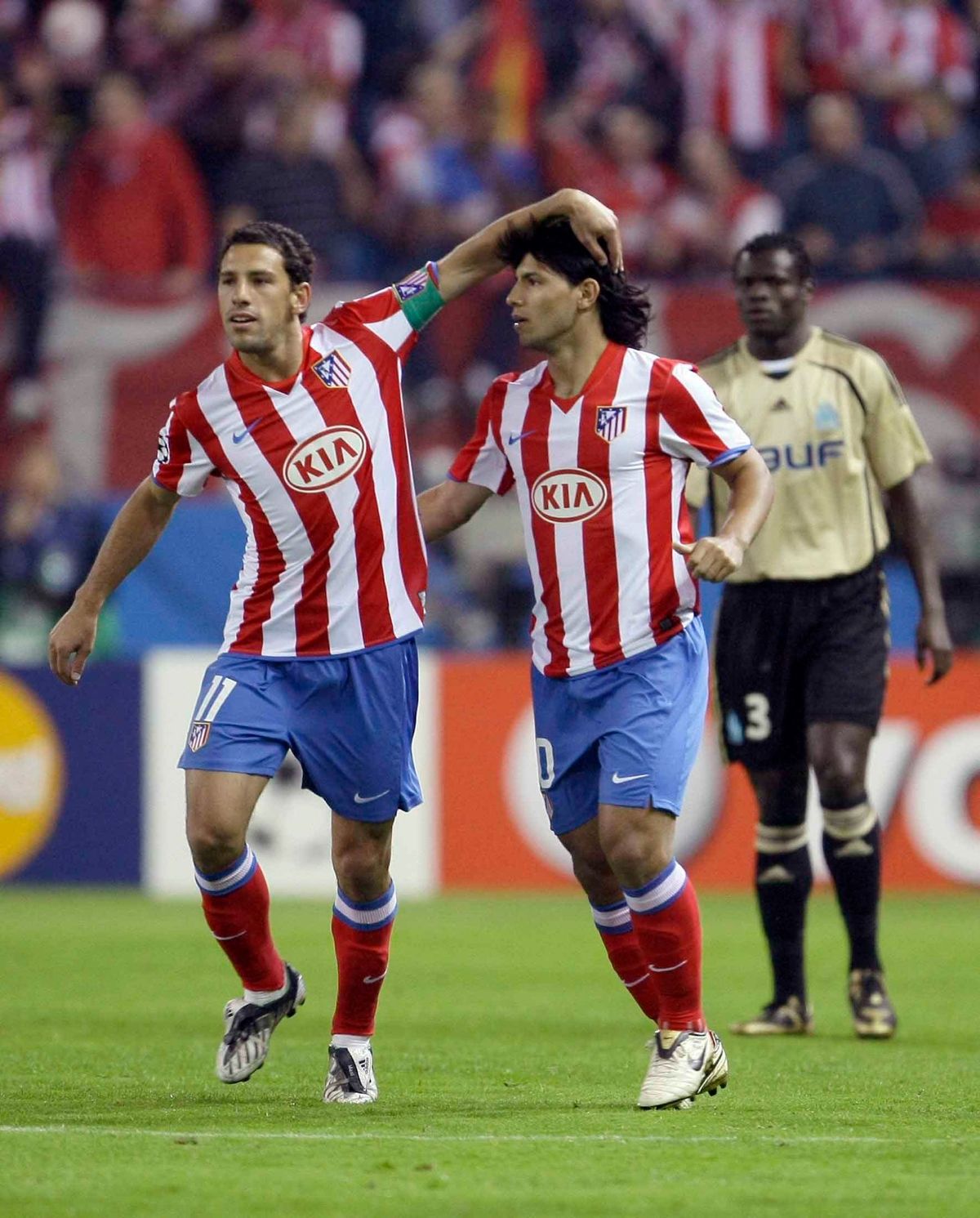 Maxi Rodríguez y el Kun Agüero.