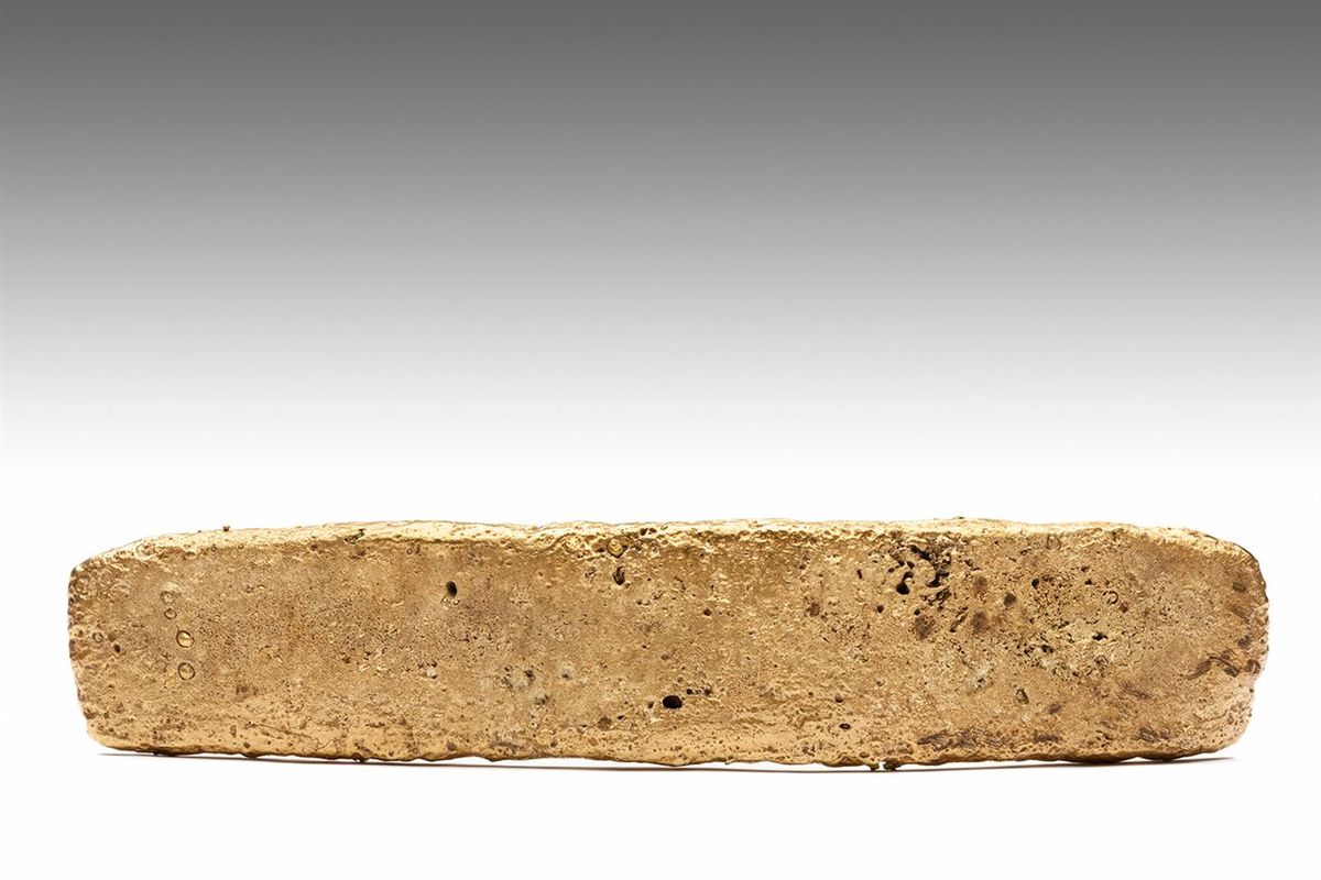 Un lingote de oro perteneciente a los mexicas y fundido por los españoles Un lingote de oro perteneciente a los mexicas y fundido por los españoles
