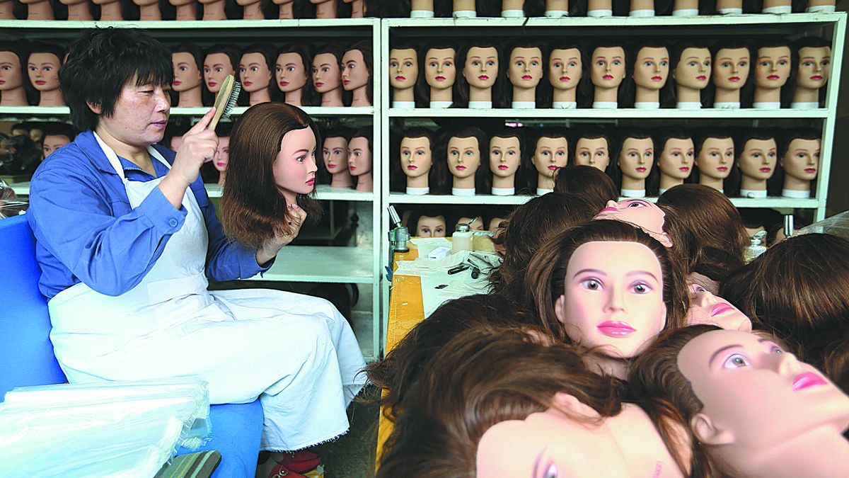 La ciudad de Xuchang, provincia de Henan, se conoce como la capital de las pelucas de China. PARA USO DE CHINA DAILY &nbsp;