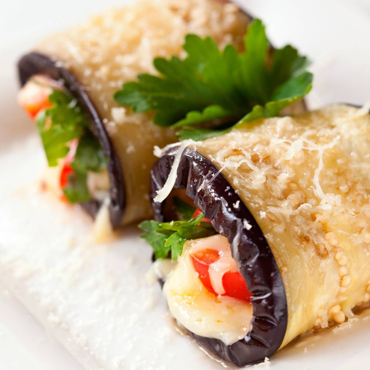 Recetas: cómo hacer Rollitos de berenjena gratinados al horno. Foto: gentileza demoslavueltaaldia. Recetas: cómo hacer Rollitos de berenjena gratinados al horno. Foto: gentileza demoslavueltaaldia.