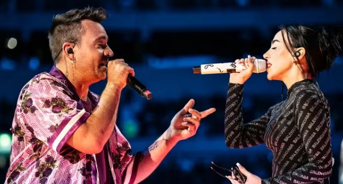 Chano y Nicki Nicole. A la rosarina se le cerró la garganta y tuvieron que repetir la canción. Chano y Nicki Nicole. A la rosarina se le cerró la garganta y tuvieron que repetir la canción. 