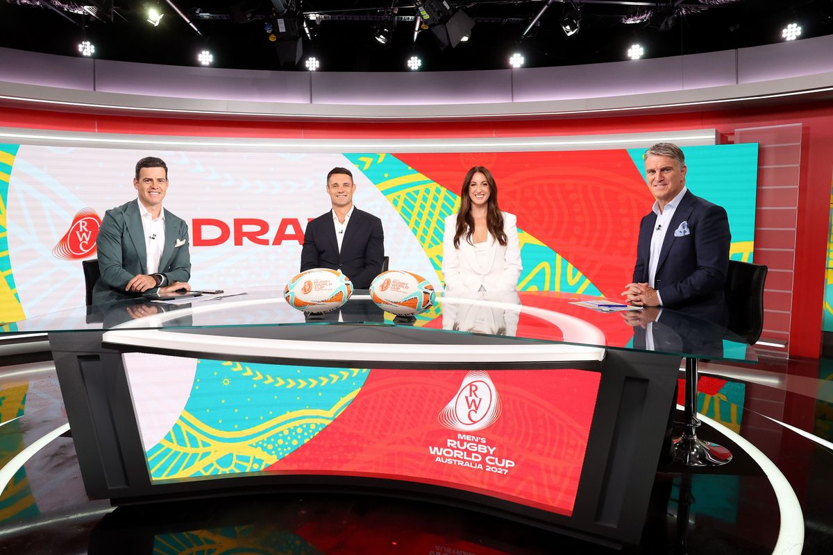 Dan Carter, leyenda de los All Blacks, y los internacionales australianos Tim Atkinson y Tim Horan, en el sorteo del Mundial de Rugby 2027.