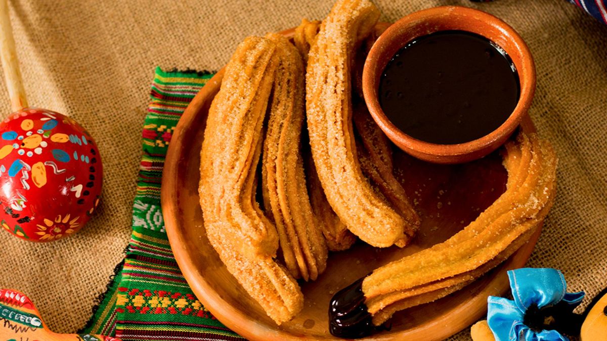 Aprende a preparar la receta de curros de feria caseros con salsa de chocolate cremosa. Foto: gentileza aceiteideal Aprende a preparar la receta de curros de feria caseros con salsa de chocolate cremosa. Foto: gentileza aceiteideal