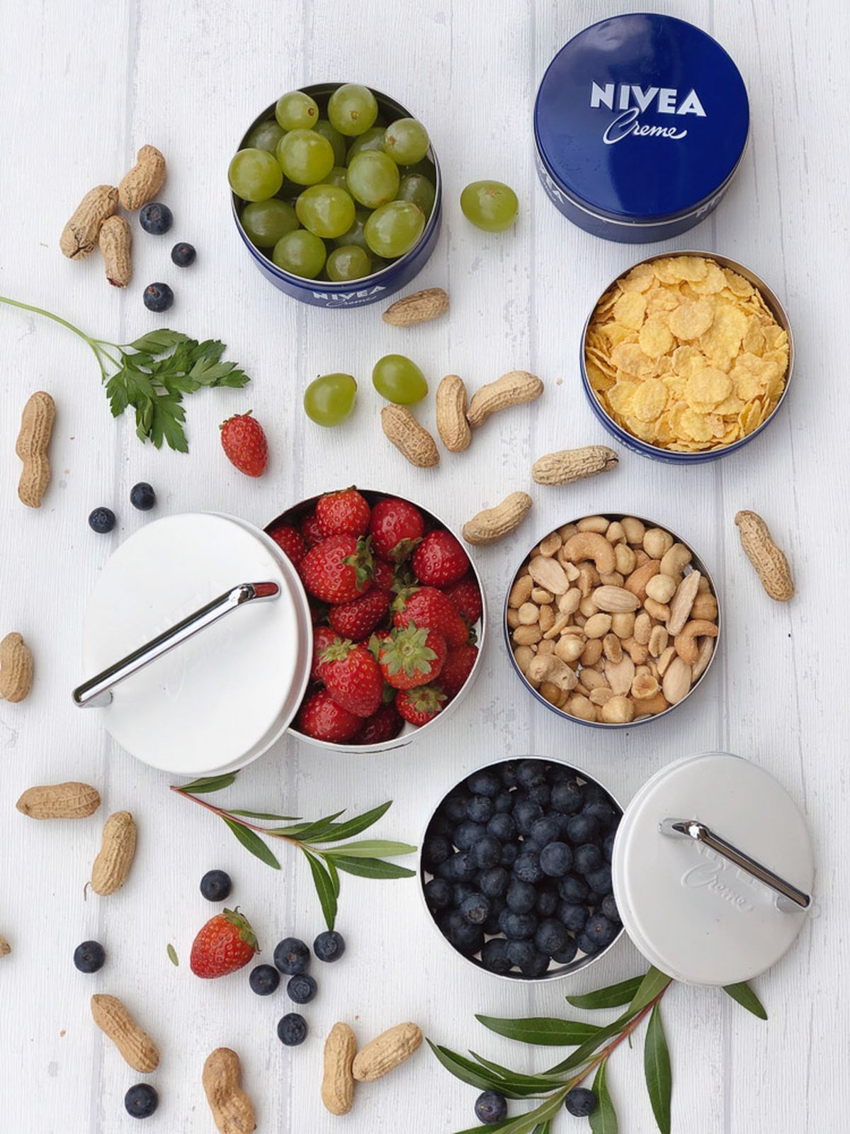 Reciclar latas de crema Nivea. Reciclar latas de crema Nivea.