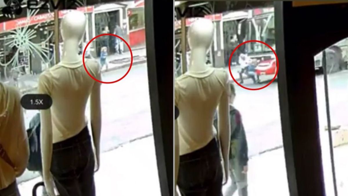 Se salvó de milagro. Video: se soltó de la mano de su papá, cruzó la calle y fue atropellado por un colectivo