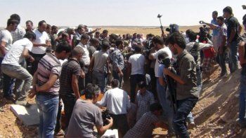 Enterraron al niño sirio ahogado mientras la UE debate una salida a la crisis de los refugiados