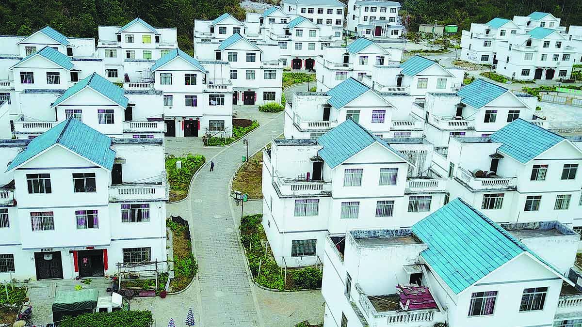 Los habitantesen la aldea de Keai del condado autónomo de la etnia maonan de Huanjiang,Región Autónoma Zhuang de Guangxi, se han reubicado a una nueva comunidad,luego de abandonar su vieja ubicación en 2017. ZHOU HUA / XINHUA