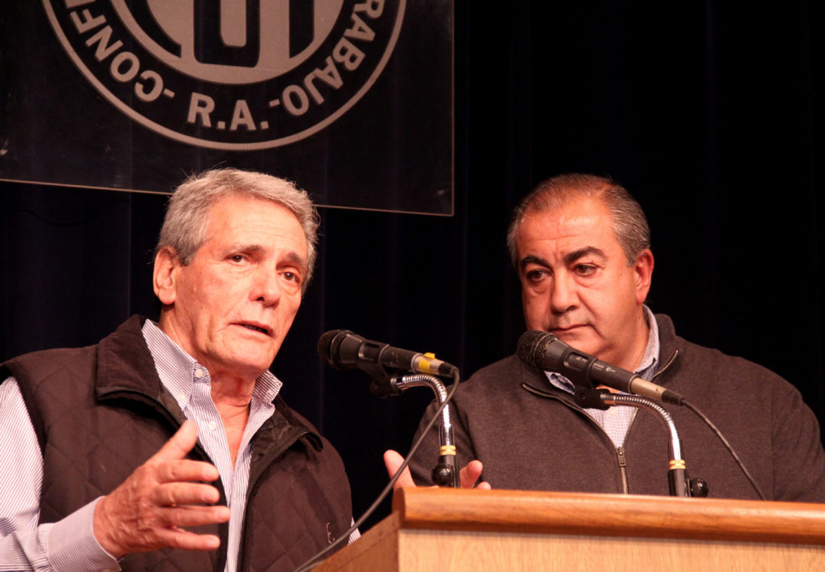 Acuña y Daer, de la CGT, bancaron los cambios del gabinete.