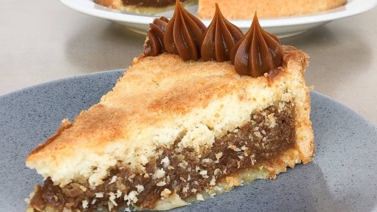 Recetas: aprende a preparar la Tarta de coco y dulce de leche para el mate. Foto: gentileza cloudfront Recetas: aprende a preparar la Tarta de coco y dulce de leche para el mate. Foto: gentileza cloudfront