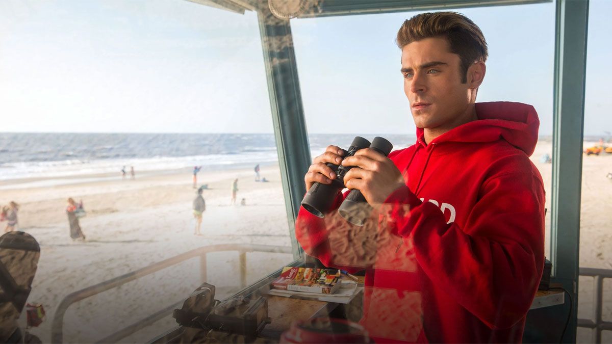 El actor Zac Efron la rompe con su papel de guardavidas en la película de Netflix. El actor Zac Efron la rompe con su papel de guardavidas en la película de Netflix.