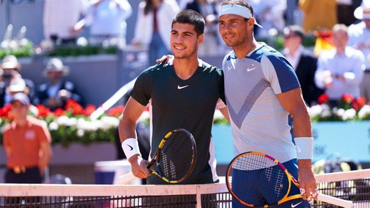 Los españoles Carlos Alcaraz y Rafael Nadal.