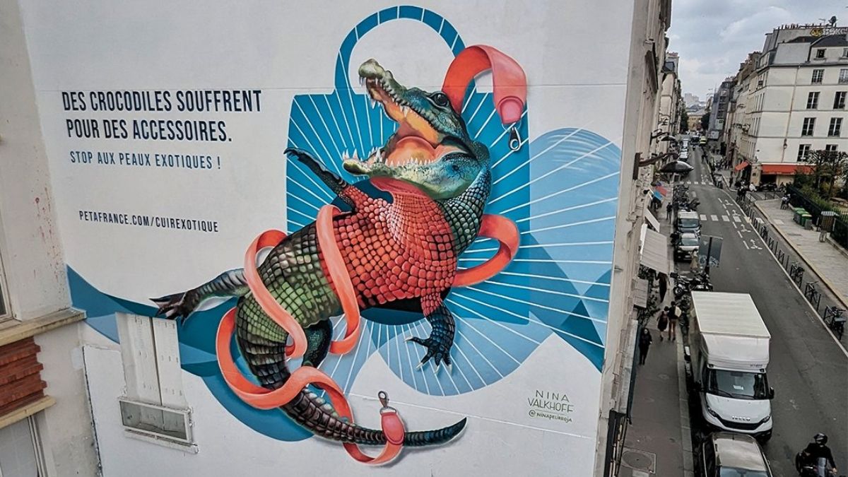 Pintura mural que hace referencia a la campaña de PETA para erradicar el uso de pieles de cocodrilo en el mundo de la moda. (Foto: PETA) Pintura mural que hace referencia a la campaña de PETA para erradicar el uso de pieles de cocodrilo en el mundo de la moda. (Foto: PETA)