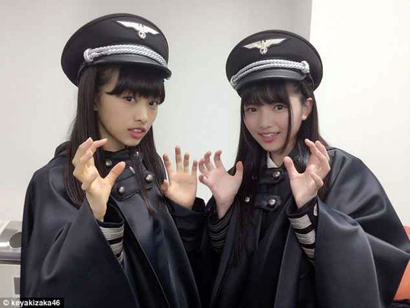 Critican a grupo japonés por usar ropa que parece de nazis