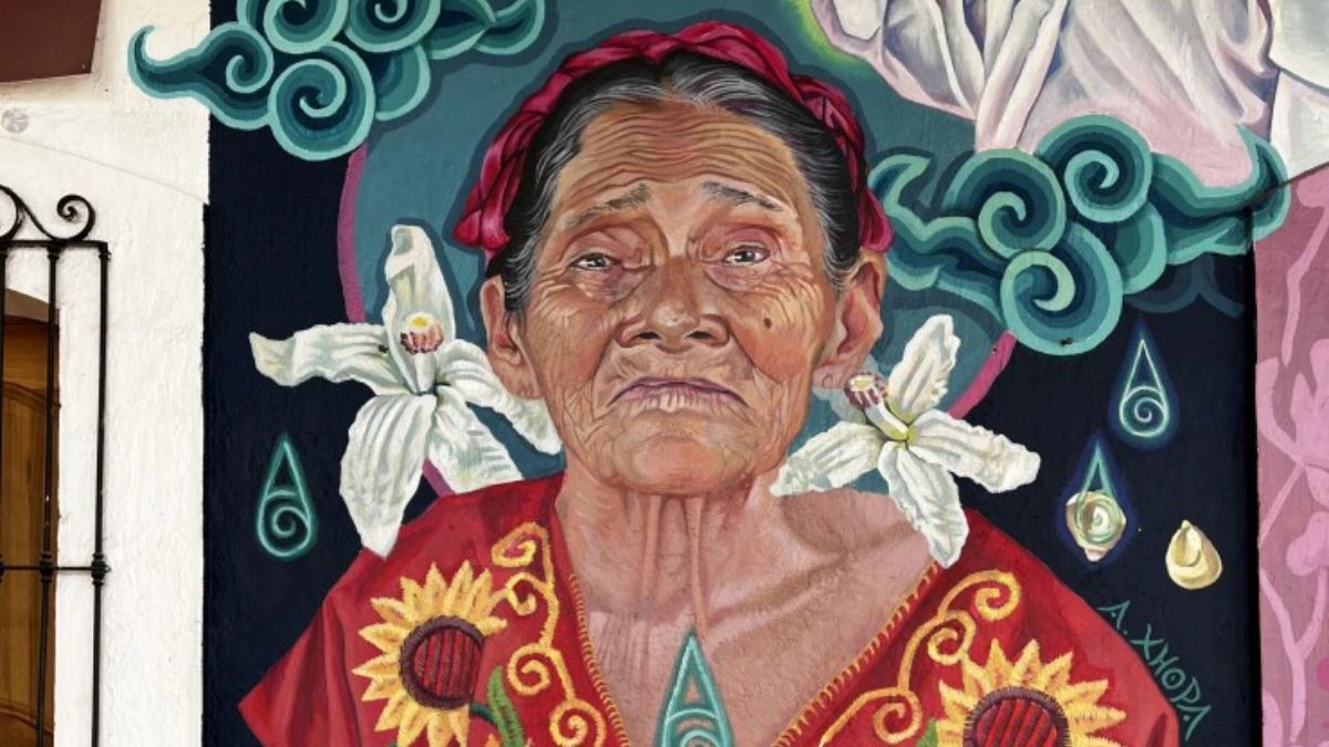 Mural en la comunidad de San Andrés Huayapam retrata el conocimiento tradicional de flores y plantas locales para preparar la bebida llamada "tejate". (Foto: Juan Mayorga) Mural en la comunidad de San Andrés Huayapam retrata el conocimiento tradicional de flores y plantas locales para preparar la bebida llamada "tejate". (Foto: Juan Mayorga)