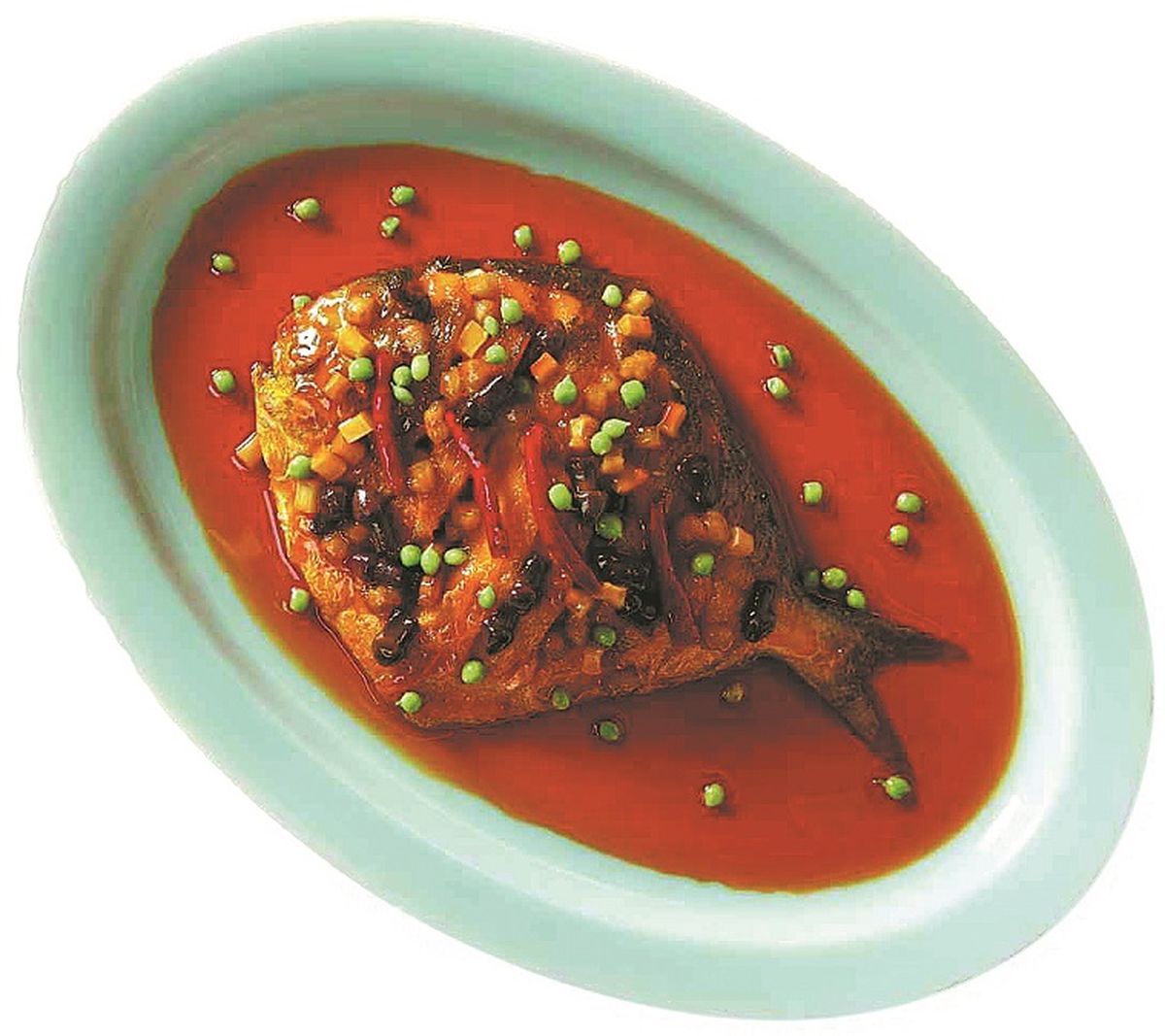 Pescado braseado, una de las comidas típicas que se disfruta en casa durante el Festival de Primavera. PARA USO DE CHINA DAILY Pescado braseado, una de las comidas típicas que se disfruta en casa durante el Festival de Primavera. PARA USO DE CHINA DAILY