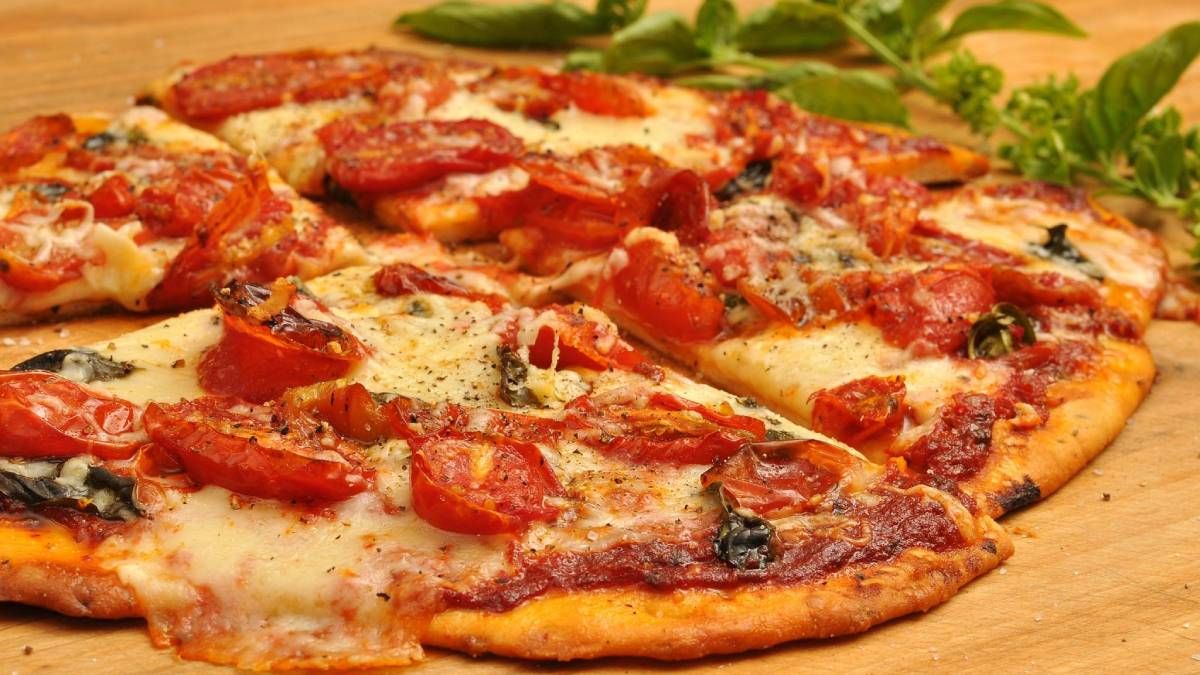 Recetas: cómo hacer masa de pizza casera, suave y crocante.